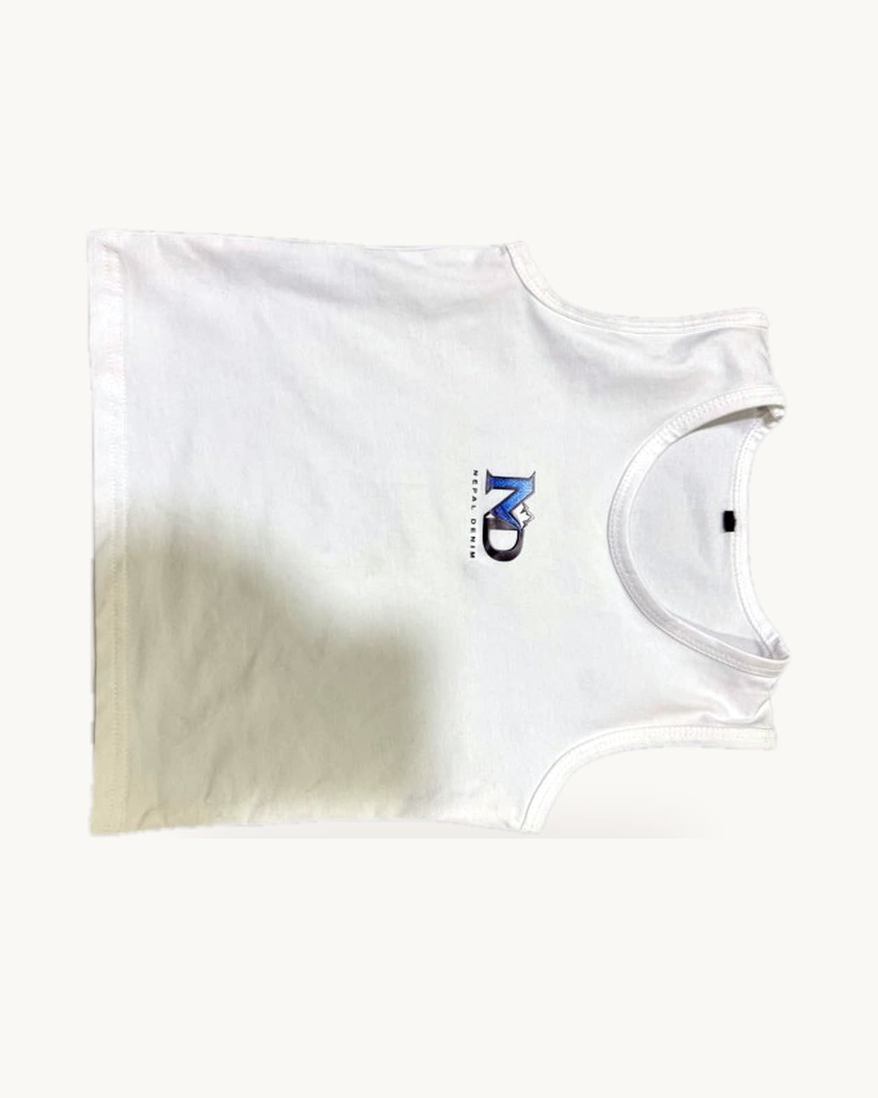 White baby sando vest, flat lay